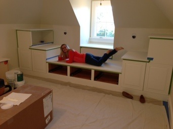 The amazingly talented designer trying out the bed portion during construction
