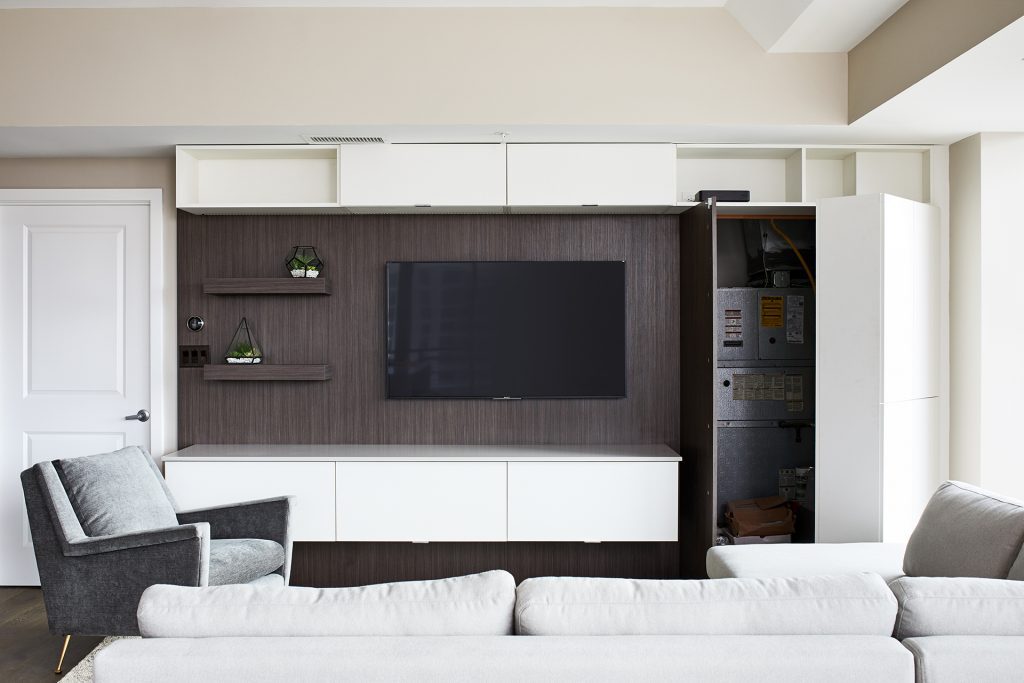 case design living room with white hidden storage with three shelves
